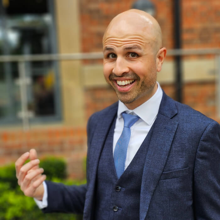 Domenico Buonocore in a blue 3 piece suit smiling